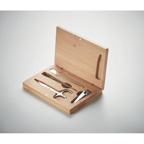 Compact 4 piece stainless steel manicure set in a magnetic bamboo case