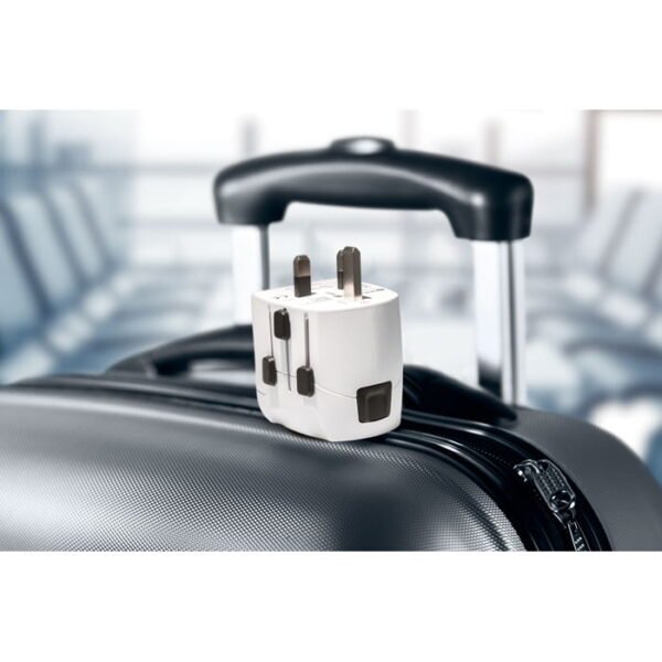 Compact 3 pole travel plug and usb charger safe and compatible worldwide